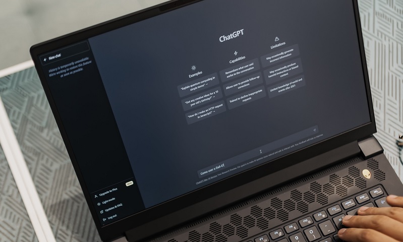 A person using ChatGPT in his Laptop